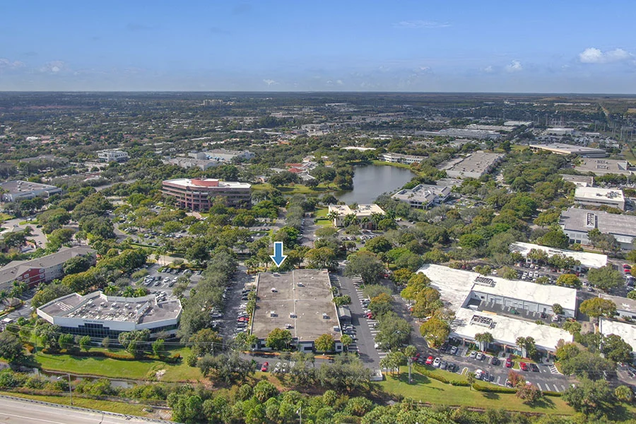 An aerial view of Northpoint Business Park with an arrow pointing to the Palm Beach Business Center